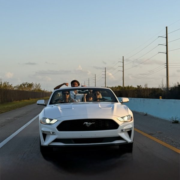 Convertible on a coastal road